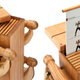 Image for article titled Start Burning Off That Turkey With This Wood and Leather Weight Set